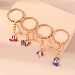 Independence Day keychain set featuring patriotic hat, bow, umbrella, and boot charms