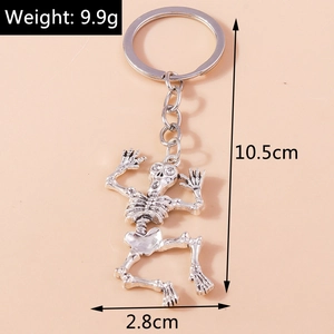 Detail view of dancing skeleton keychain with size dimensions and weight info