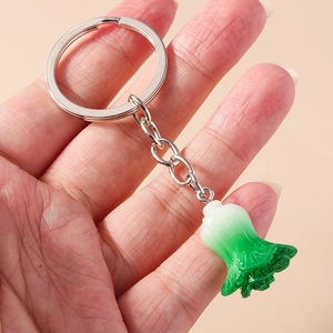 Detailed view of a realistic Chinese cabbage keychain with vibrant green and white gradients