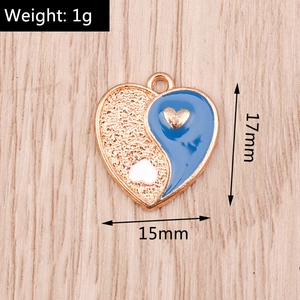Detail of 17mm Yin Yang heart pendant with gold plating and blue enamel finish