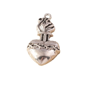 Vintage silver metal sacred heart pendant with crown of thorns and flame detail