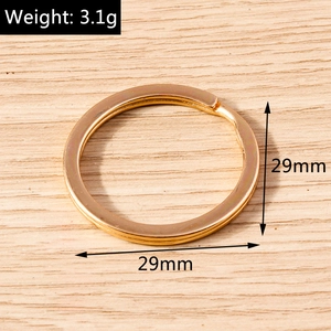 Macro detail of 29mm gold plated alloy key ring with 3.1g weight and polished finish