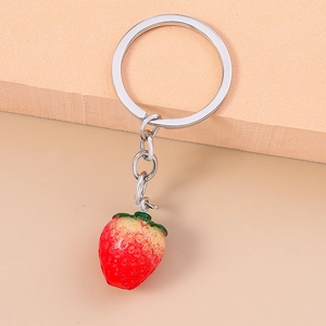 Detailed view of creative realistic strawberry keychain with textured gradient finish