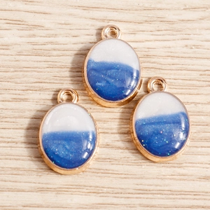 Pendentifs ovales en alliage avec dégradé bleu et bordure dorée pour bijoux DIY