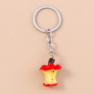 Detailed view of creative 3D apple core keychain with realistic resin fruit texture