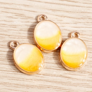 Trois pendentifs ovales or rose avec dégradé de résine jaune-blanc pour bijoux DIY
