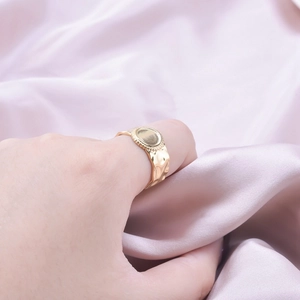 Minimalist gold-tone 304 stainless steel ring with hammered texture and flat round top