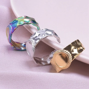 Detail of adjustable 304 stainless steel rings with hammered texture and DIY round base