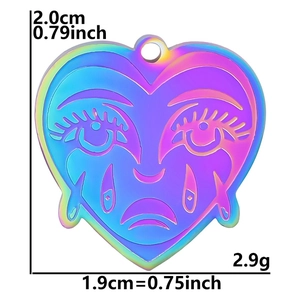 Detailed size view of an 18k gold plated stainless steel crying heart pendant