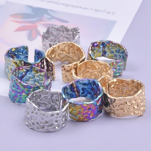 Minimalist geometric textured open ring set in gold, silver, and rainbow steel finish