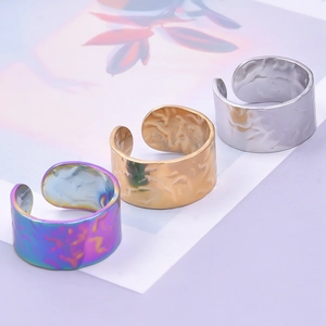 Three-piece set of adjustable hammered texture stainless steel rings in rainbow gold and silver