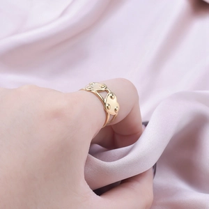 Minimalist gold adjustable open heart ring with beads shown on index finger