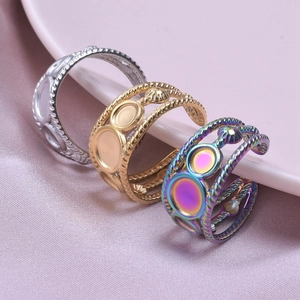 Detail of twisted rope ring bands in silver, gold, and rainbow with DIY round bezel settings