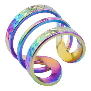 Detail of multi-layer rainbow plated stainless steel ring with hammered texture detail