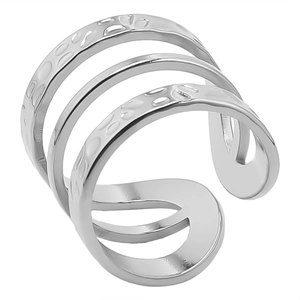 Detailed macro view of silver triple-layered open ring with hammered metal texture