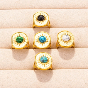 Set of five bohemian gold-plated stainless steel rings with colorful gemstone inlays