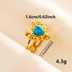 Adjustable gold stainless steel ring featuring a heart-shaped turquoise stone inlay