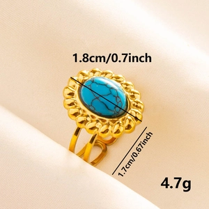 Bague ajustable en acier doré avec turquoise ovale et détails de pétales de tournesol