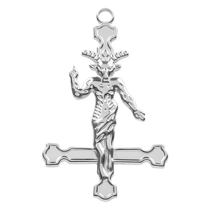 Macro detail of silver Baphomet goat head pendant with inverted cross in stainless steel