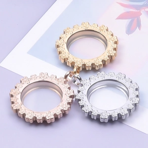 Three-piece round floating locket pendants in gold, rose gold and silver with daisy relief