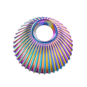 Macro detail of rainbow stainless steel shell charm with radial texture and iridescent finish