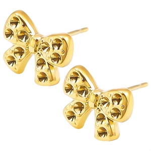 Vintage gold bow earrings in 304 stainless steel with geometric dotted texture detail