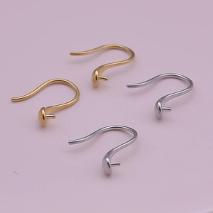 Detail of 304 stainless steel geometric earring hooks in gold and silver finishes