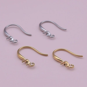 Close-up of geometric 304 stainless steel earrings in gold and silver finishes