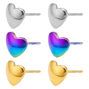 Three pairs of heart-shaped stainless steel earrings in silver, gold, and iridescent colors