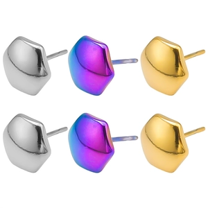 Macro detail of geometric 304 stainless steel earrings in silver, gold and rainbow colors