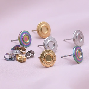 Macro shot of 304 stainless steel round stud earrings in gold, silver and rainbow finish