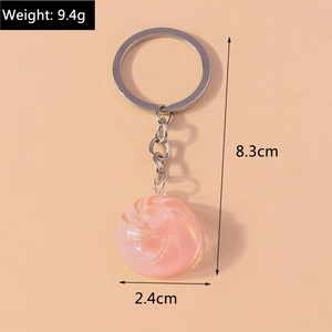 Detail of pink crystal candy keychain with silver ring showing weight 9.4g and height 8.3cm