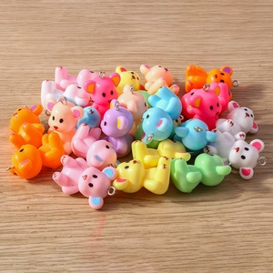 Detail of colorful resin gummy bears pendants for DIY jewelry crafts and keychains