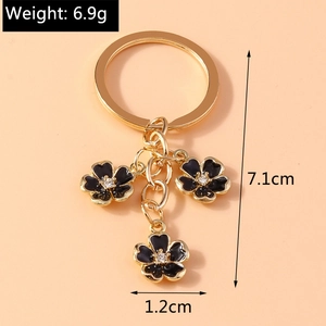 Creative Chinese style keychain with three black enamel five-leaf flowers and white crystals