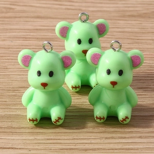 Three mint green resin bear charms with matte texture and silver metal rings for jewelry