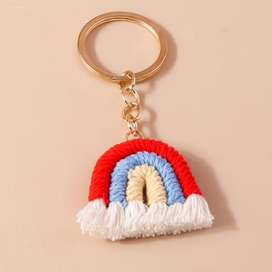 Handmade bohemian rainbow keychain with colorful cotton cord and soft white tassel