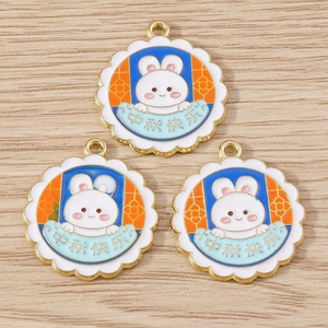 Detail of Chinese Mid-Autumn rabbit pendants with enamel Mid-Autumn Festival greeting