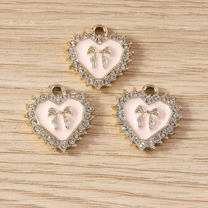 Roze hartvormige hanger met gouden strik en kristallen voor DIY-sieraden set van 3