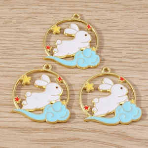 Detail of three rabbit mooncake pendants with enamel clouds for DIY Chinese festival jewelry