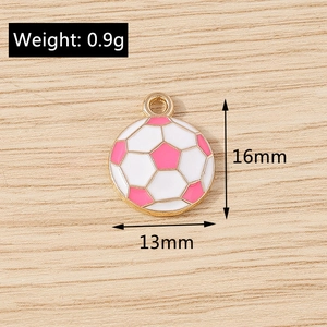Detailed view of pink and white enamel football charm for DIY jewelry making