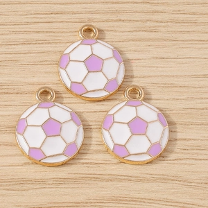Detailed close-up of soccer ball charms in white and purple enamel with gold alloy base
