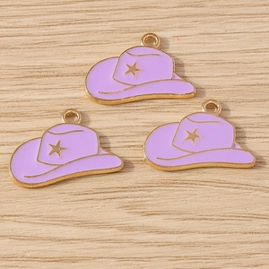Three purple alloy cowboy hat pendants with gold trim and star details for DIY jewelry