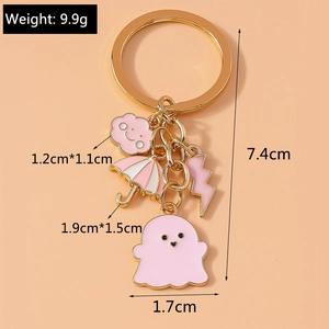Pink enamel keychain size details showing cute cloud and umbrella charms in gold