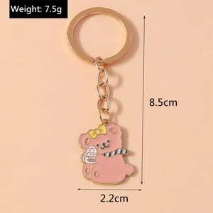 Pink cartoon bear keychain showing 8.5cm height and 2.2cm width dimensions