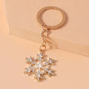Golden snowflake keychain with sparkling rhinestones for bags or phone accessories