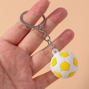 Minimalist white and yellow soccer ball keychain with metal ring for sports backpacks