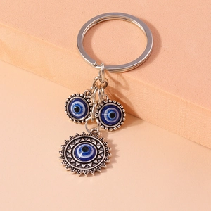 Retro Evil Eye keychain accessory for bags and phones in polished silver metal