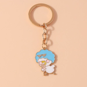 Detailed view of duck keychain with blue curly hair, pixel sunglasses, and ice cream charm