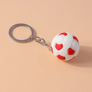 Close-up of red and white football keychain with a polished silver-tone metal ring