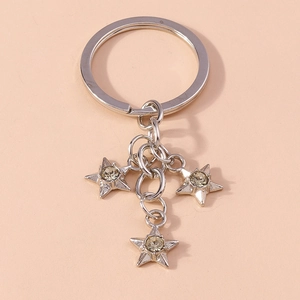 Detail shot of silver metal star keychains with inset sparkling round crystals